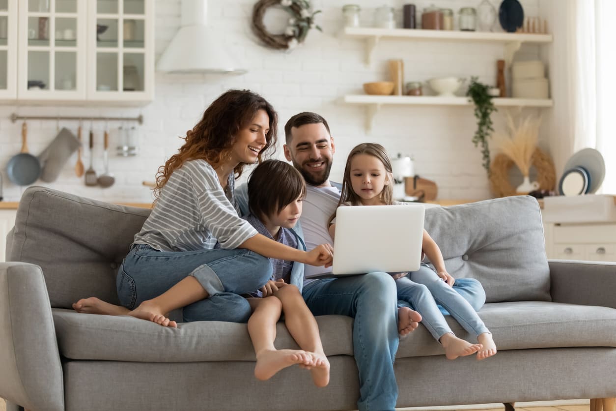 Eurolife blog | Family at home with laptop