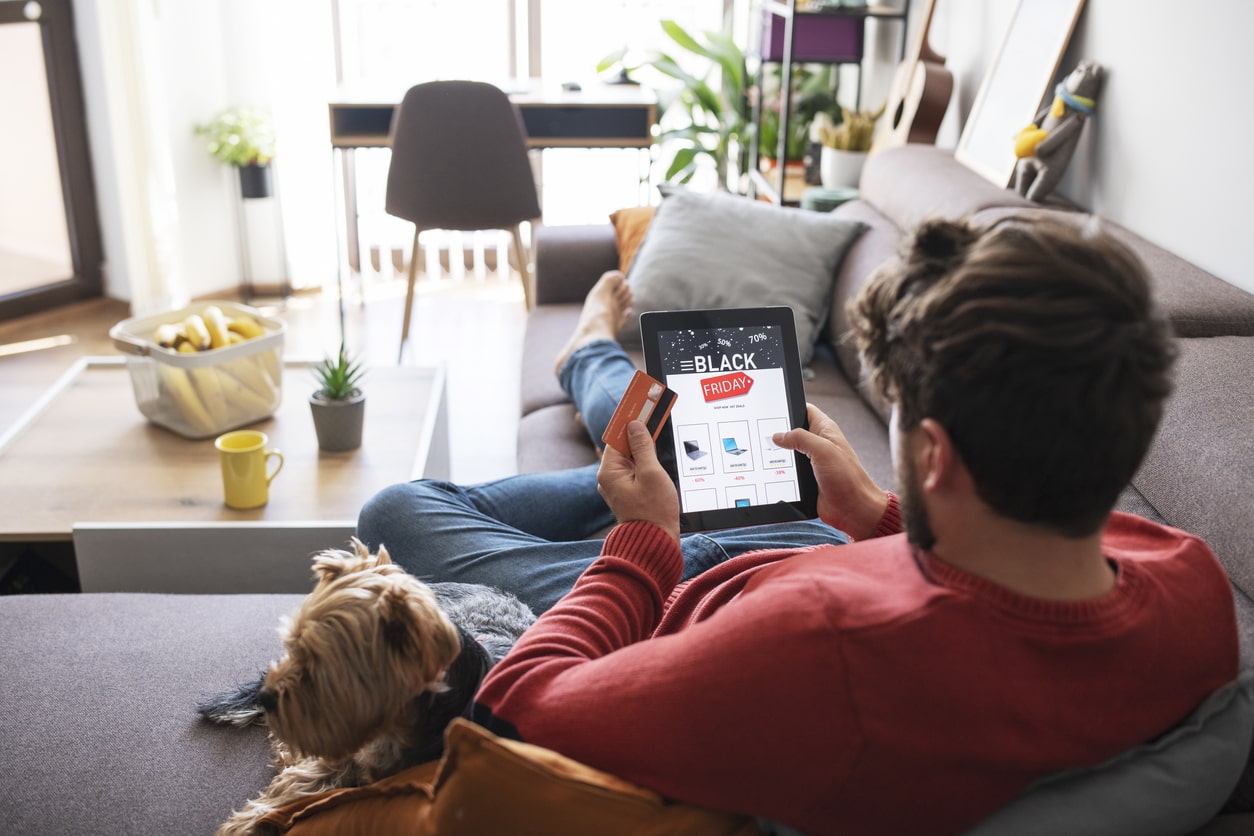 Man Shopping Electronics Online During Black Friday Sale