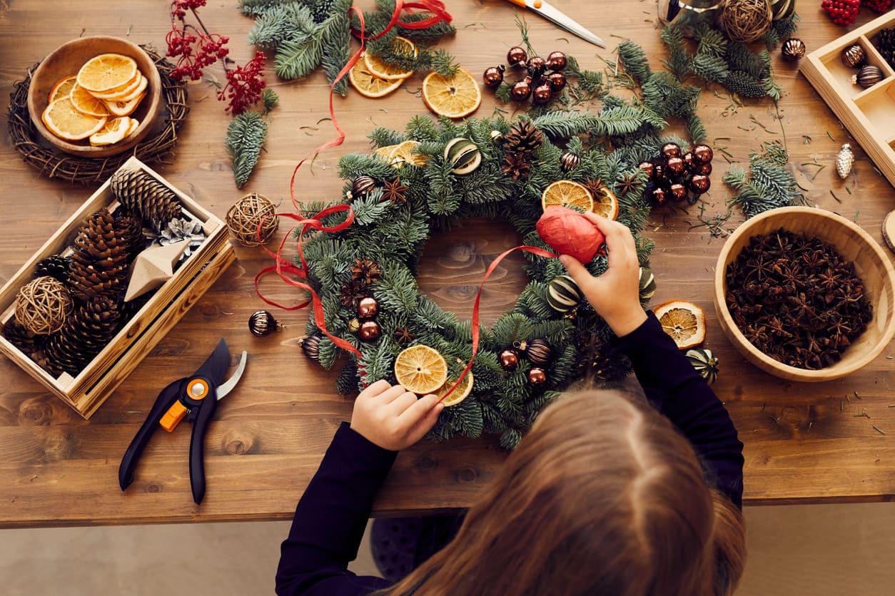 Eurolife blog - woman creating handmade Christmas decoration at home