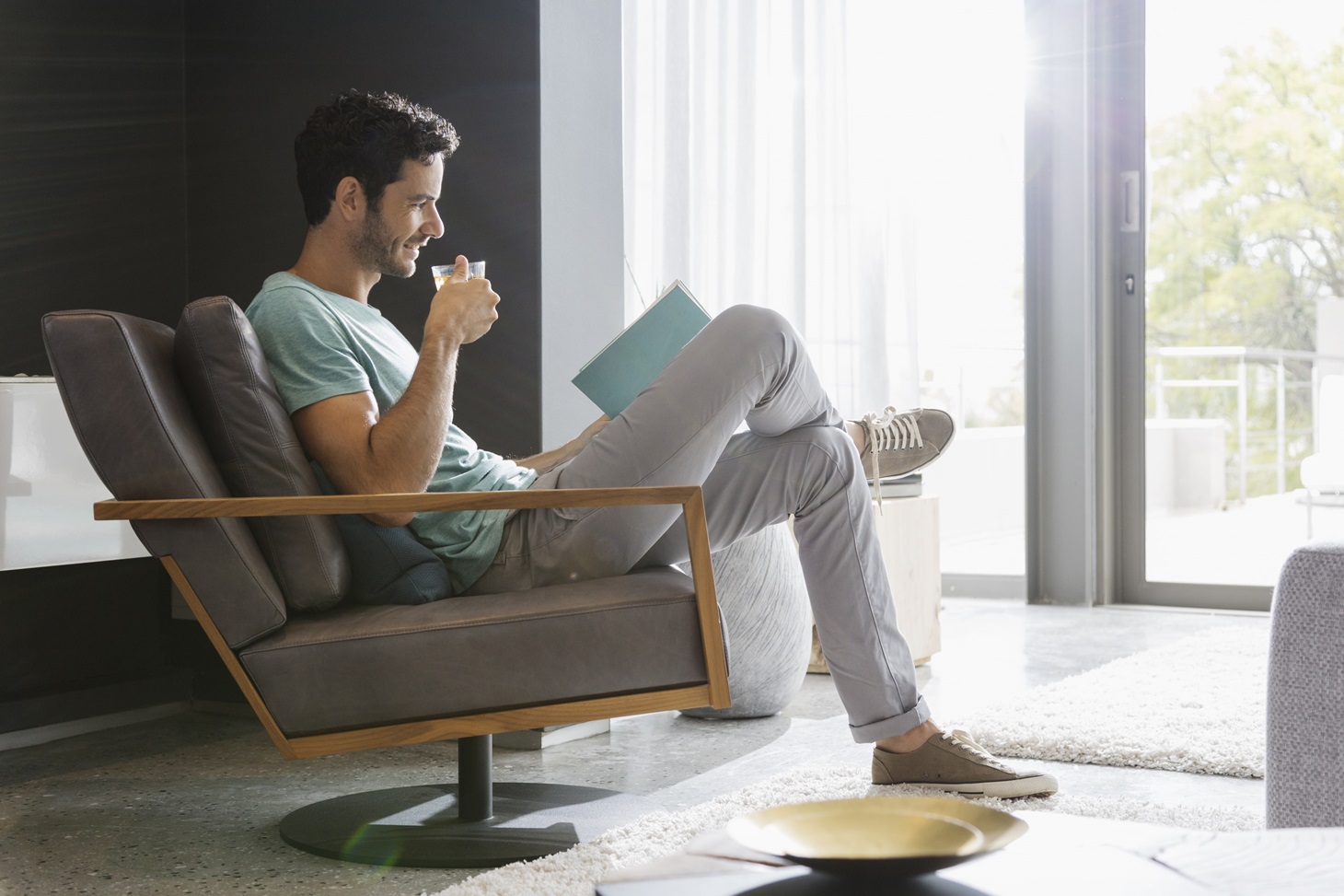 eurolife-blog-man-sitting-in-his-living-room-relaxed